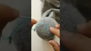 Mending a hole using a simple parachute stitch 