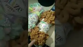 моя первая подушка пончик из пряжи alize puffy