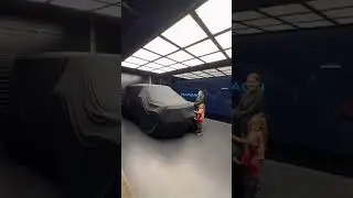 Louisa said I shouldn't show you yet, she wants to show you the car herself 