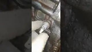Coolant drain plug for a 1.6-liter Lancer 9 engine