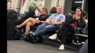 CANDID AIRLINES CROSSED LEGS