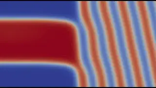 Boundary Tension Between Coexisting Phases of a Block Copolymer Blend