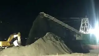LOADING OF SAND STOCKPILE FROM PELICAN BARGE