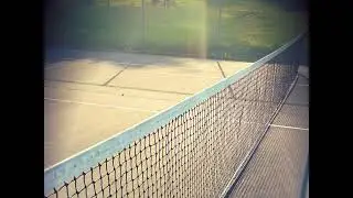 Sunday morning tennis match ambience.