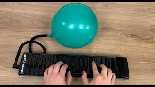Playing Melodica with a Balloon