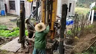 Dig a well in the mountain by water drilling rig machine