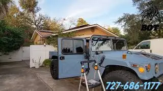 American flag inside the humvee soft top