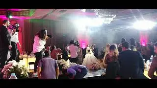 Guests React Awkwardly After Photographer Falls Off Stage During Wedding - 1168690