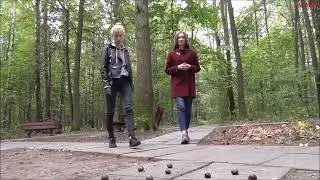 Two girls find a group of snails