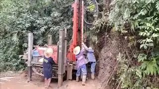 Dig a well in the mountain by water well drilling rig