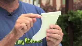 How to attach fins to a surfboard