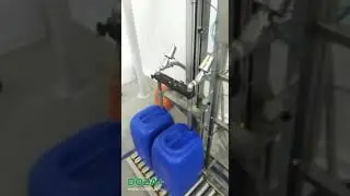 Двухканальный весовой дозатор с рольгангом, розлив в канистры.