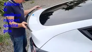 Pose de l'aileron , logo et lavage de la Tesla model Y