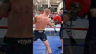 Andy Savage hitting pads after sparring
