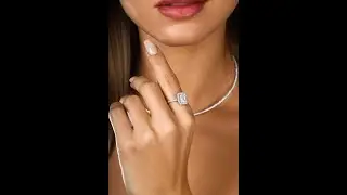 טבעת היילו משובצת יהלומים בחיתוך בגטים