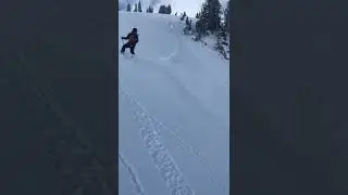 AVALANCHE - Ski cutting a loose snow problem from the start zone of a couloir.