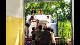 Cara menurunkan mesin fotocopy dari mobil truck