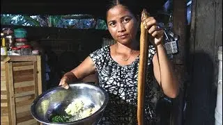 Village food factory -  beautiful girl  cooking eel