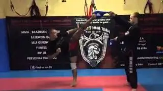 Round kick to spin hook kick .