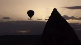 Hot air balloons at dawn in Cappadocia