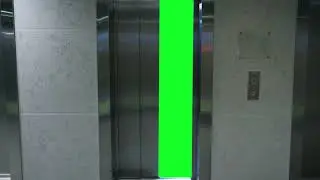 Office elevator with a green screen