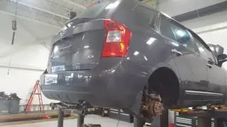 08 Kia Rondo on the lift