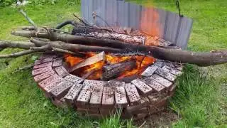 Anybody else ever do this?  Hot coals + lots of air = HOT FIRE.