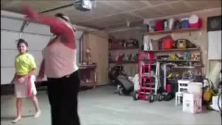 Teen Teaches Little Girl Tahitian Routine