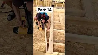 The Process Of Assembling A Sloped Wall During Frame Construction 