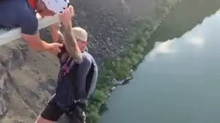 Get over your fear of heights....man jumps
