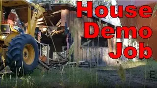 Old Ford Backhoe Demolishing a House