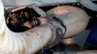 Priora resonator repair, broken studs, welding in a repair insert.
