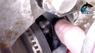 The CV joint boot is torn. Quick emergency repair in the field.