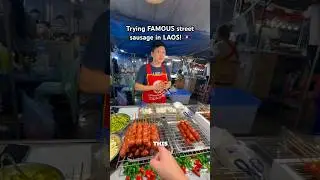 Trying famous street sausage in Laos! #laos #laosfood #streetfood #travel