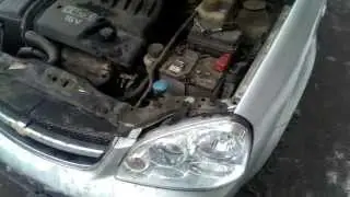 Замена лампы ближнего света фар Chevrolet Lacetti