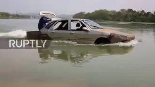 Chinês apresenta seu Carro Anfíbio e diz ser James Bond Pobre do oriente