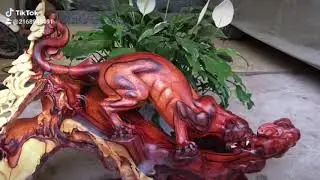 Tượng báo gỗ cẩm siêu thần thái