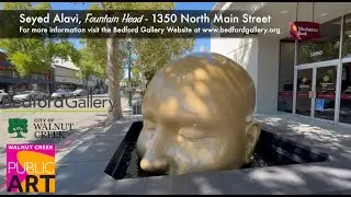 Iconic Sculpture Fountain Head Returns to Main Street After Extensive Restoration
