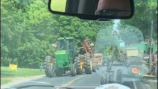 Two tractors on the road