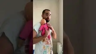 How to hold your baby upright and how NOT to carry him