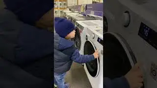 Steele Checking Out Washing Machines in Currys 