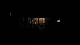 A dark view from outside the cabin