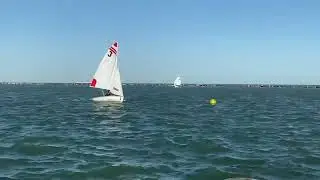 Young People Learning to Steer a Sail Boat
