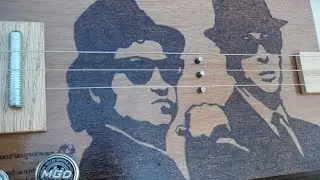 The Jake-Elwood Custom 3 string electric Cigar Box Guitar