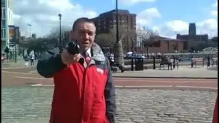 Security guard threatens to take mobile phone.