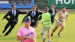 Rushing the field at a Baseball game with personal security guards