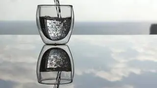 Water pouring in glass