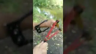 A slingshot shoots pellets. 