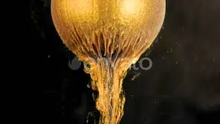 Golden Shine Paint Slowly Flows From the Ball | Stock Footage - Envato elements