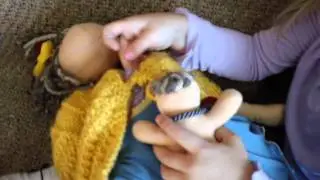 Playing with her MamAmor Doll!
